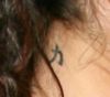 megan fox neck tattoo